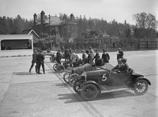 Morris, Morgan and Crouch cars on the start line of a motor race, Brooklands, 1914. Artist: Bill Brunell.