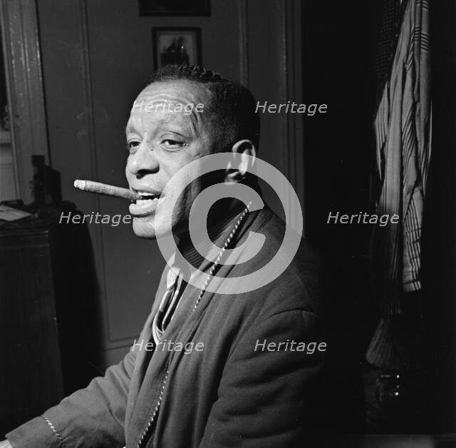 Portrait of Willie Smith in his apartment, Manhattan, New York, N.Y., ca. Jan. 1947. Creator: William Paul Gottlieb.
