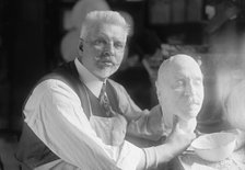 U.S.J. Dunbar with Death Mask of Admiral Dewey, 1917. Creator: Harris & Ewing.