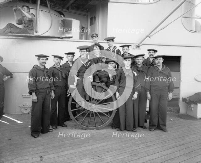 U.S.S. New York, a gun crew, anniversary of Santiago, 1899, 1899. Creator: Edward H Hart.