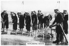 Scrubbing the deck on board HMS 'Nelson', 1937. Artist: Unknown