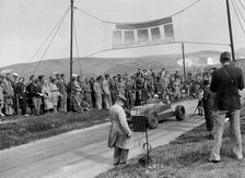 CK Mortimer's Alta with twin rear wheels on the start line at the Lewes Speed Trials, Sussex, 1938. Artist: Bill Brunell.