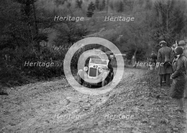 Austin 7 Boyd Carpenter 2-seater sports of GBL Willis taking part in the Inter-Varsity Trial, 1930. Artist: Bill Brunell.