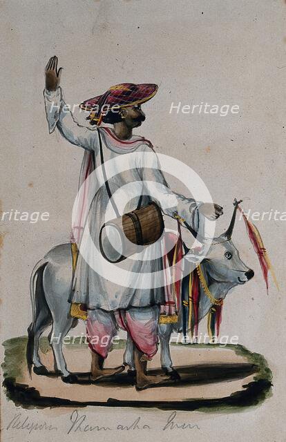 A religious man carrying a drum, standing next to a cow, (between 1800 and 1899?). Creator: Unknown.