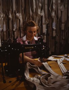 Making harnesses, Mary Saverick stitching, Pioneer Parachute Company Mills, Manchester, Conn., 1942. Creator: William Rittase.