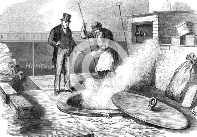 Sketches in the Bank of England: burning returned bank-notes, 1872. Creator: Unknown.