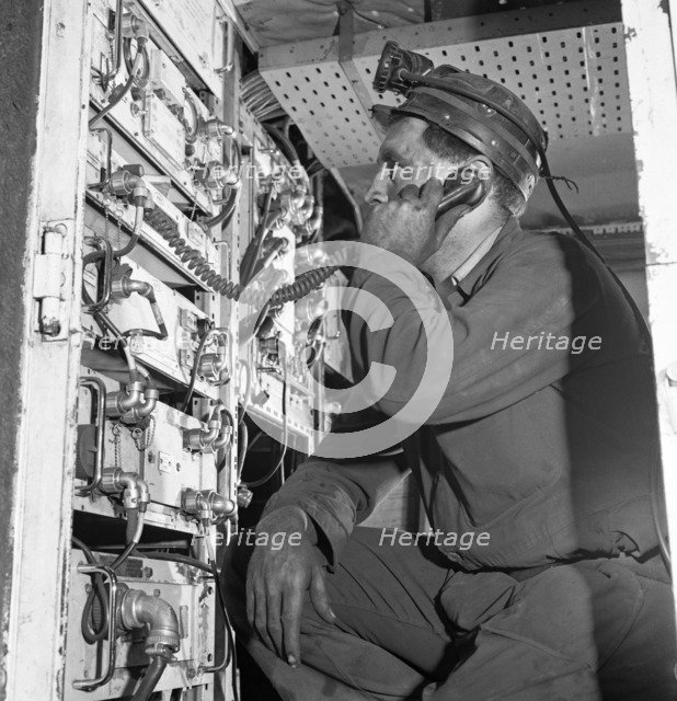 Comunications, a miner from Bevercotes Colliery, Nottinghamshire, 1967.  Artist: Michael Walters