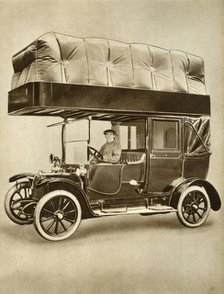 Taxi cab with gas-bag device on specially fitted roof, 1914-1918, (1935). Creator: Unknown.