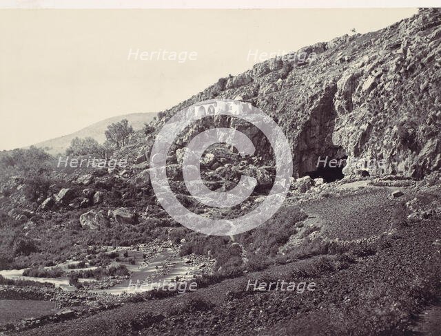 Principal Source of the Jordan, Flowing From a Cave Near Banias, Near the Site of the ..., ca. 1857. Creator: Francis Frith.