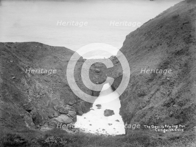The Devil's Frying Pan, Cadgwith Cove, Cornwall, 1896-1920. Artist: Alfred Newton & Sons.