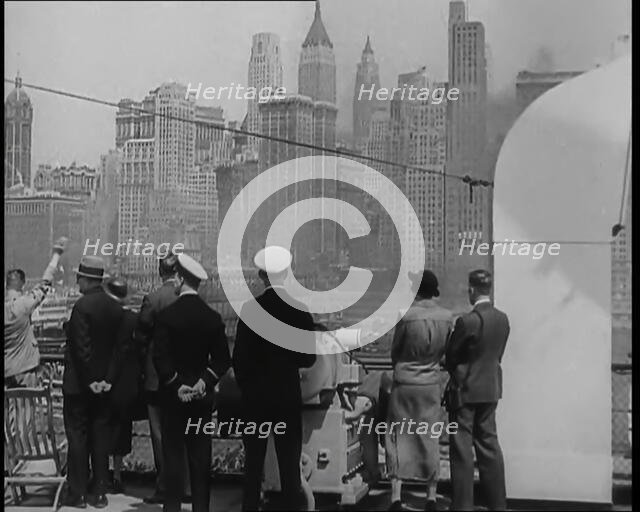 Passengers of the 'Queen Mary' Looking Out at New York City, 1936. Creator: British Pathe Ltd.