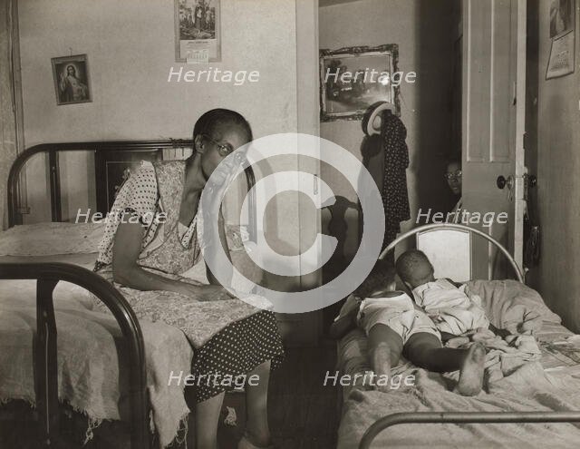 Mrs. Ella Watson, who has been a government charwoman..., Washington, D.C., 1942. Creator: Gordon Parks.