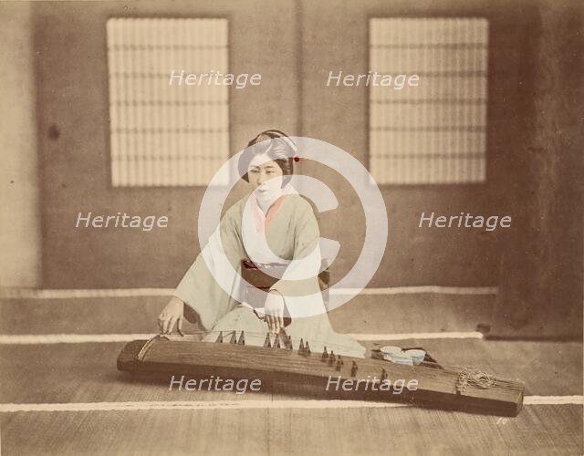 Japanese Woman Playing a Koto, 1865-1875. Creator: Unknown.
