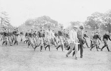 Yale Squad coming on field, Bomeisler, Spalding, Mack, Dr. Bull, between c1910 and c1915. Creator: Bain News Service.