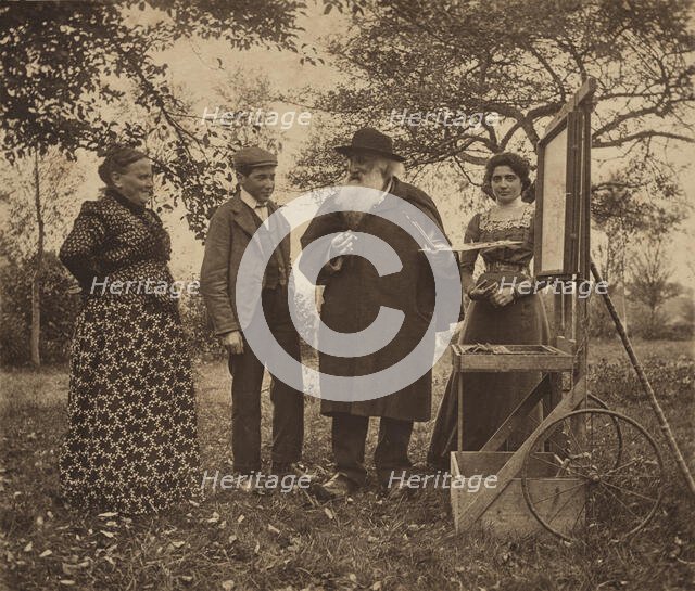 Camille Pissarro, Julie, Jeanne and Ludovic-Rodo at an easel in the orchard, c1890s. Creator: Unknown.