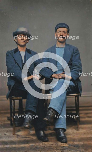 Two Seated Young Men Holding Hands, 1880s. Creator: Unknown.