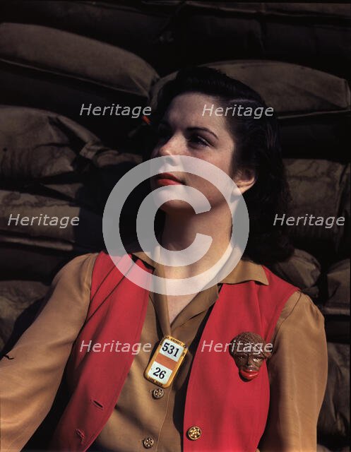 A noontime rest for a full-fledged assembly worker...Long Beach, Calif. Plant of Douglas..., 1942. Creator: Alfred T Palmer.