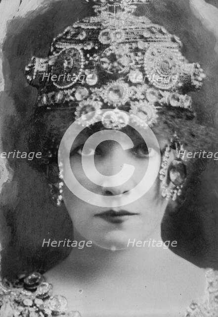 Sarah Bernhardt with elaborate headdress, 1912. Creator: Bain News Service.
