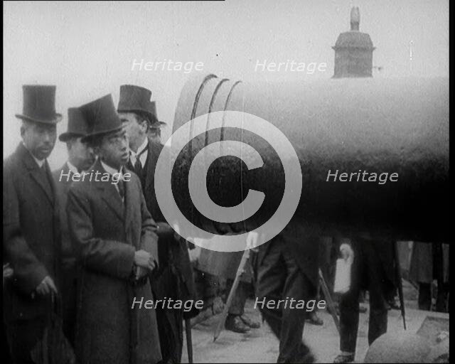Japanese Prince Regent Hirohito Inspecting a Large Cannon With Japanese Dignitaries on the..., 1921. Creator: British Pathe Ltd.