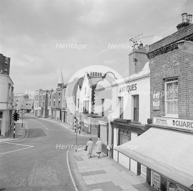 A street view looking from Battersea High Street towards Battersea Church Road, 1962-1964. Creator: John Gay.