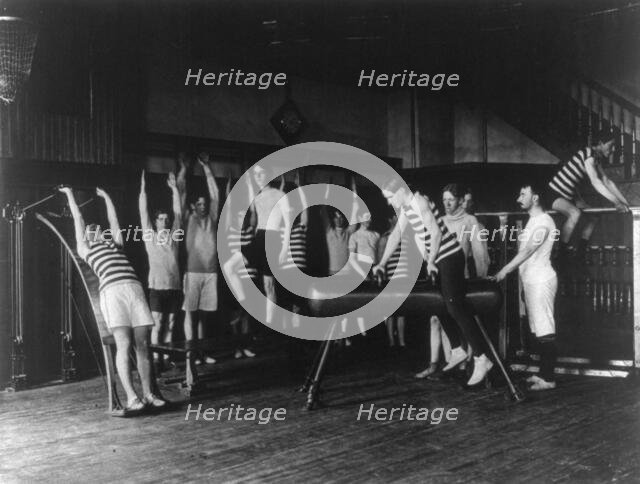 Male students exercising, some with equipment, Western High School, Washington, D.C., (1899?). Creator: Frances Benjamin Johnston.