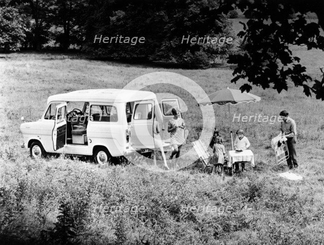 Family group with a 1968 Ford Explorer Camper van, (1968?). Artist: Unknown