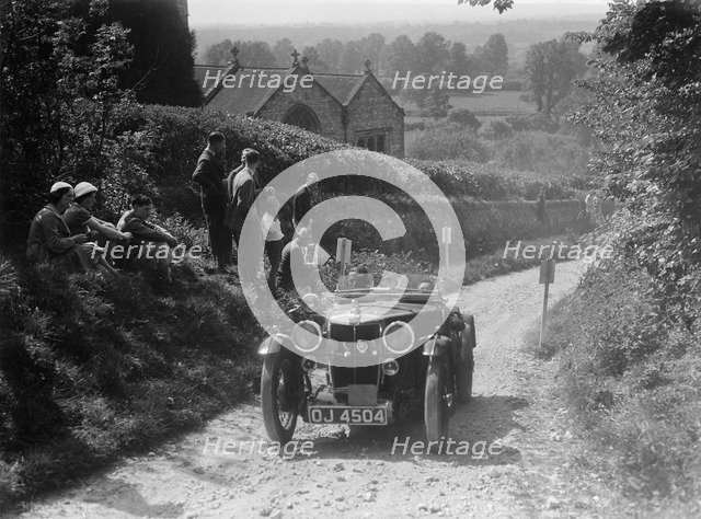 1932 MG J2 Standard taking part in a West Hants Light Car Club Trial, Ibberton Hill, Dorset, 1930s. Artist: Bill Brunell.