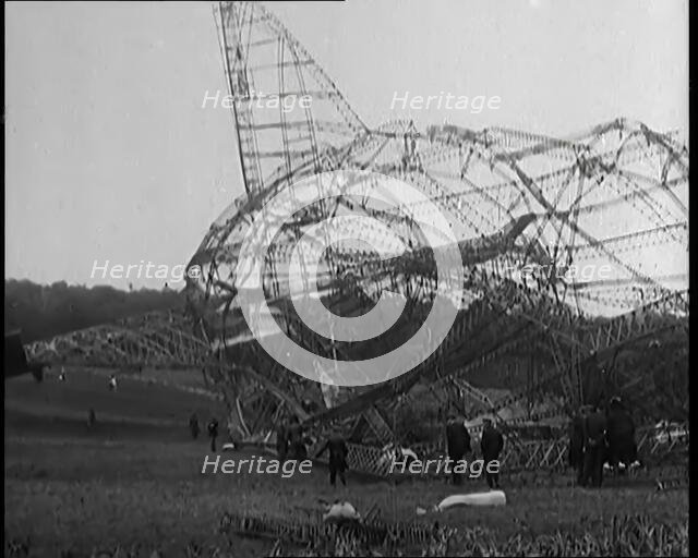 The Burnt Remains of the R-101 Airship Lying on the Ground After Fire and Destruction, 1930. Creator: British Pathe Ltd.