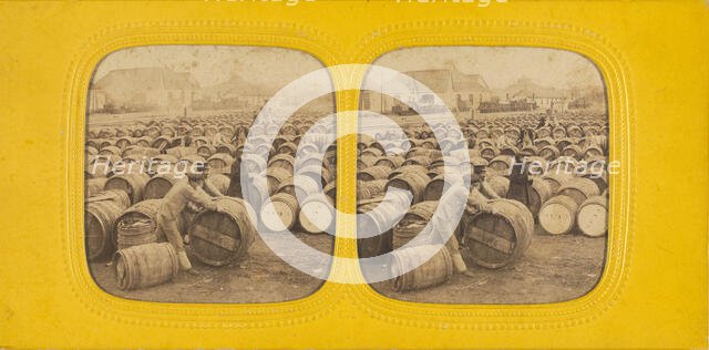 Men rolling a barrel in a field of barrels, 1860s. Creator: E Lamy.