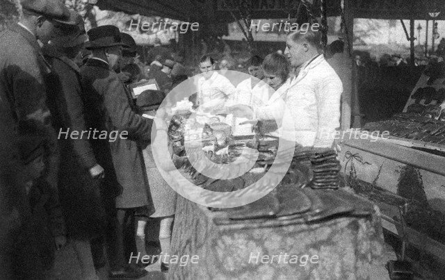 Gingerbread seller, Paris, 1931. Artist: Ernest Flammarion