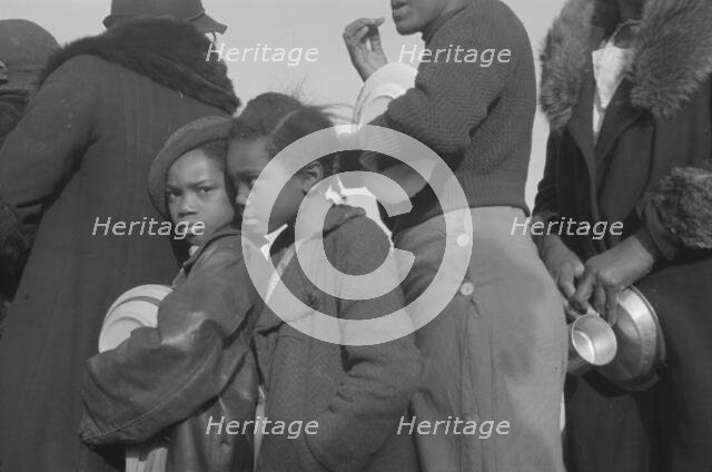 Negroes in the lineup for food at meal time at the camp for flood..., Forrest City, Arkansas, 1937. Creator: Walker Evans.