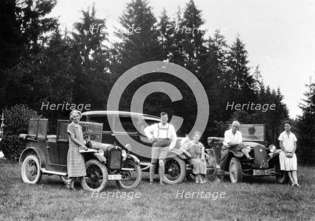 A group of people on an outing with their cars, c1929-c1930. Artist: Unknown