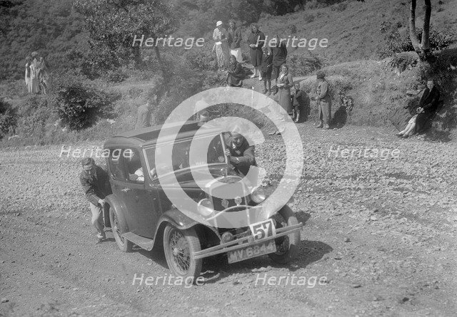 Austin 10 saloon at the Mid Surrey AC Barnstaple Trial, Beggars Roost, Devon, 1934. Artist: Bill Brunell.