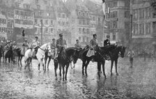 'Petain et Foch a Strasbourg; Le 27 novembre: le marechal Foch, a cheval, entre les..., 1918. Creator: Unknown.