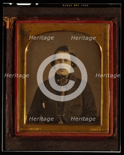 Unidentified man, half-length portrait, seated, facing front, between 1848 and 1860. Creator: Montgomery Simons.