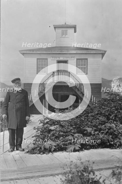 Father William Duncan, a missionary, in front of town library, between c1900 and 1923. Creator: Unknown.