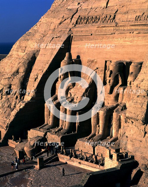 Façade of the Great Temple of Ramses II at Abu Simbel. It has four seated colossi of Ramses II an…