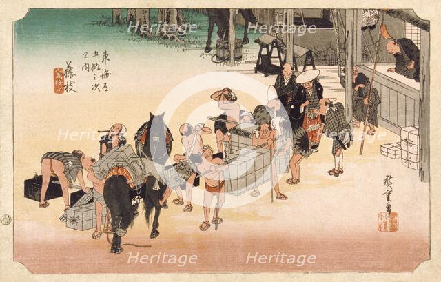 Changing Horses and Porters at Fujieda Station, between c1833 and c1834. Creator: Ando Hiroshige.