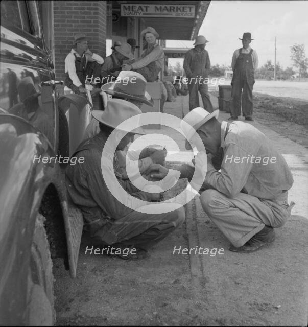 Dust bowl farmers of west Texas in town, 1937. Creator: Dorothea Lange.