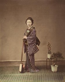 [Japanese Woman in Traditional Dress Posing with Instrument], 1870s. Creator: Unknown.