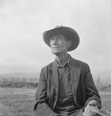 Farmer from Nebraska now developing eighty-acre stump farm, Bonner County, Idaho, 1939. Creator: Dorothea Lange.