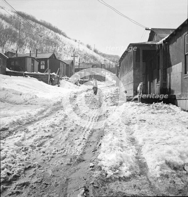 Main street in a Utah coal mining settlement, Consumers, near Price, Utah, 1936. Creator: Dorothea Lange.