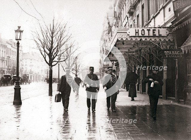 Guards on the street, Brussels, 1898.Artist: James Batkin