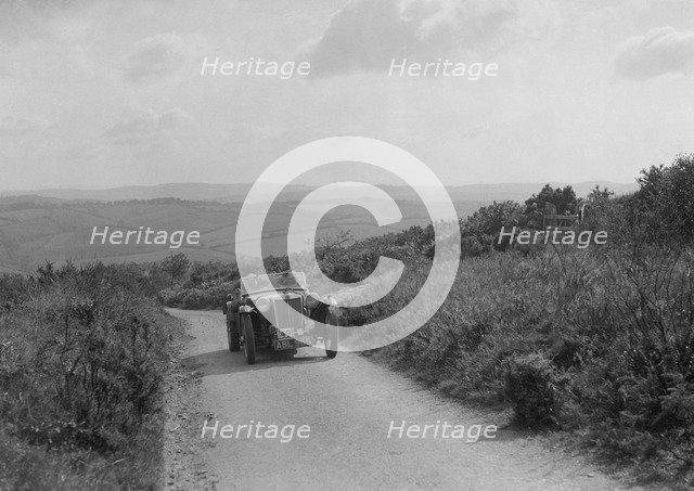 MG TA of WJ Green competing in the MCC Torquay Rally, 1938. Artist: Bill Brunell.