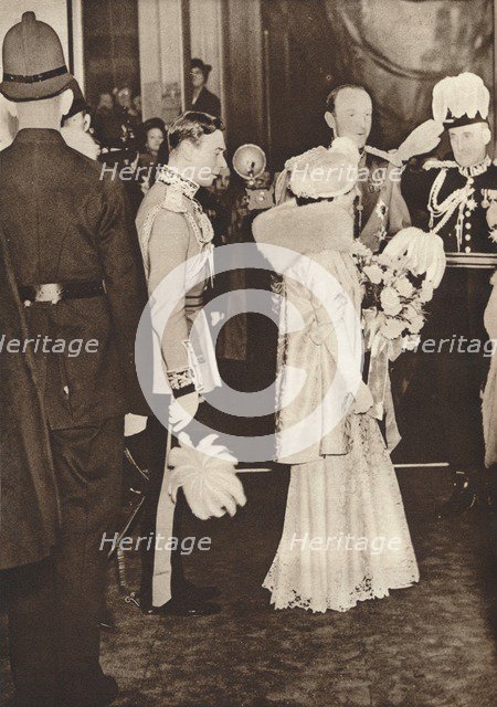 'King George VI and Queen Elizabeth leaving a luncheon in honour of coronation', 1937. Creator: Unknown.