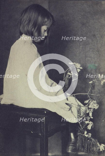 Child with oak branch, c1900. Creator: Eva Watson-Schutze.