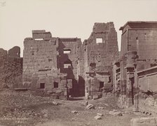 Madinet Habu, Exterior of the Entrance Gate of Mortuary Temple of Ramesses III, late 19th century. Creator: Henri Bechard.