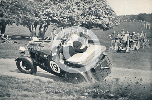 'The beginning of a spill at Donington Park', 1937. Artist: Unknown.