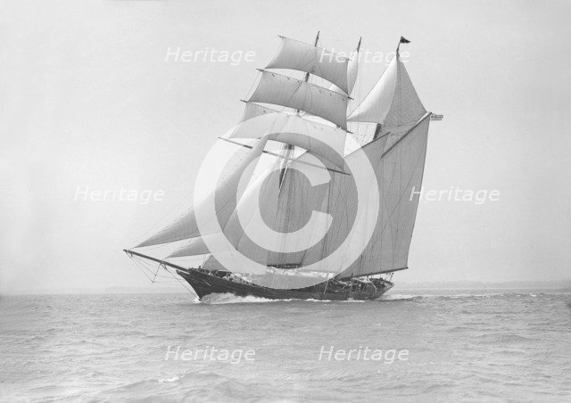 The auxiliary schooner 'La Cigale' sailing close-hauled, 1913. Creator: Kirk & Sons of Cowes.