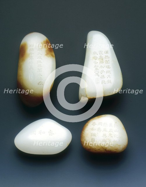 Set of four jade pebble paper weights, Qing dynasty, China, probably 18th century. Artist: Unknown